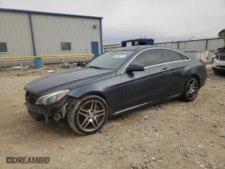 2014 Mercedes-Benz E-Class E 550 with VIN WDDKJ7DB9EF270977, listed as a Copart auction lot 83598174 with 121,476 mi miles and Salvage Title. Bid and sale history available at carsss.com. Image 1.
