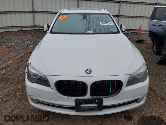 2012 BMW 7 Series 750Li xDrive z VIN WBAKC8C54CC434833, wystawiony jako Copart lot #69899284 z przebiegiem 110 959 mil mil oraz Szkoda całkowita • Salvage title. Historia ofert i sprzedaży dostępna na DreamBid. Obrazek 5.