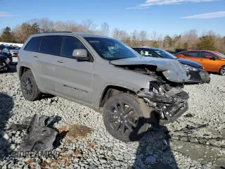 2022 Jeep Grand Cherokee WK Laredo E with VIN 1C4RJFAG1NC118440, listed as a Copart auction lot 42715565 with 79,275 mi miles and Salvage Title. Bid and sale history available at carsss.com. Image 4.