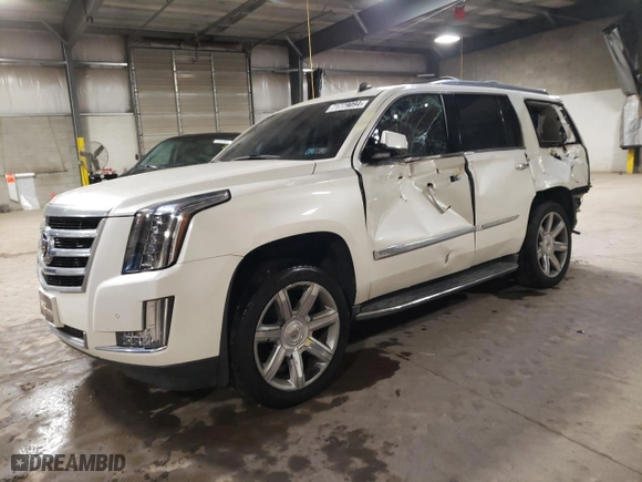 2015 Cadillac Escalade Luxury with VIN 1GYS4BKJ9FR157930, listed as a Copart auction lot 71779094 with 121,077 mi miles and Salvage Title. Bid and sale history available at carsss.com. Image 1.