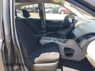 2014 Dodge Grand Caravan SXT with VIN 2C4RDGCG7ER265931, listed as a IAAI auction lot 42141644 with 205,968 mi miles and . Bid and sale history available at DreamBid. Image 5.
