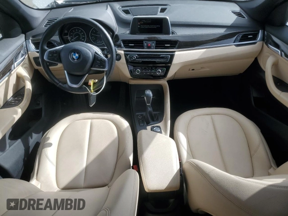 2017 BMW X1 sDrive28i with VIN WBXHU7C33H5H32827, listed as a Copart auction lot 50348265 with 117,412 mi miles and Salvage Title. Bid and sale history available at carsss.com. Image 8.
