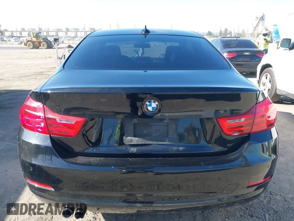 2015 BMW 4 Series 428i z VIN WBA3N7C59FK223243, wystawiony jako IAAI lot #42296442 z przebiegiem 161 232 mil mil oraz . Historia ofert i sprzedaży dostępna na DreamBid. Obrazek 16.