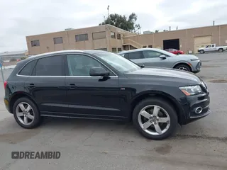 2011 Audi Q5 Premium Plus z VIN WA1DKAFP8BA081763, wystawiony jako IAAI lot #42343565 z przebiegiem 106 193 mil mil oraz . Historia ofert i sprzedaży dostępna na DreamBid. Obrazek 13.