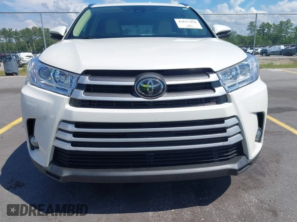 2019 Toyota Highlander SE with VIN 5TDKZRFH7KS551929, listed as a IAAI auction lot 42627458 with 84,117 mi miles and . Bid and sale history available at DreamBid. Image 6.
