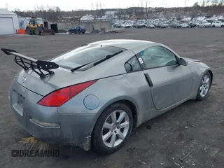 2005 Nissan 350Z Touring with VIN JN1AZ34E85M652465, listed as a IAAI auction lot 41418161 with 153,099 mi miles. Bid and sale history available at carsss.com. Image 4.
