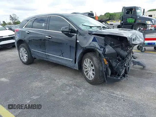 2018 Cadillac XT5 FWD with VIN 1GYKNARS3JZ137039, listed as a IAAI auction lot 41667581 with 98,281 mi miles. Bid and sale history available at carsss.com. Image 1.