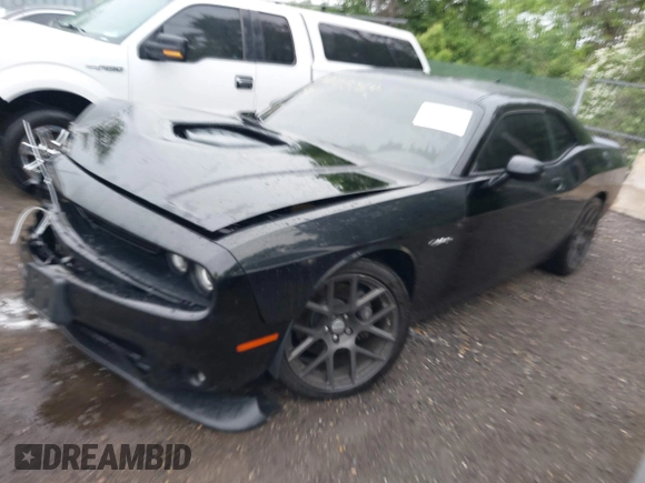 2016 Dodge Challenger R/T Scat Pack with VIN 2C3CDZFJ1GH265333, listed as a IAAI auction lot 42205764 with 68,195 mi miles and . Bid and sale history available at DreamBid. Image 2.