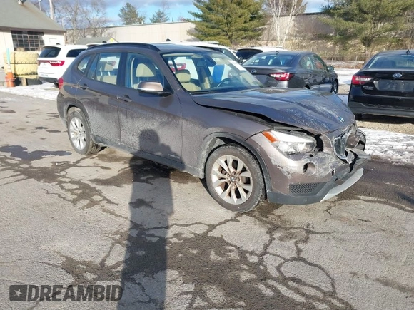 2014 BMW X1 xDrive28i with VIN WBAVL1C56EVY19340, listed as a IAAI auction lot 41340436 with 85,867 mi miles. Bid and sale history available at carsss.com. Image 1.