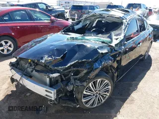 2023 Nissan Altima SL with VIN 1N4BL4EV4PN409827, listed as a IAAI auction lot 41660359 with 27,364 mi miles and . Bid and sale history available at DreamBid. Image 6.