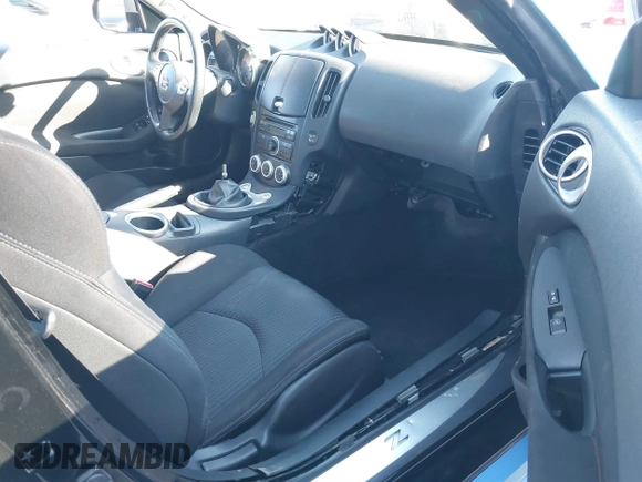 2012 Nissan 370Z Touring with VIN JN1AZ4EH5CM561472, listed as a IAAI auction lot 41640522 with 101,143 mi miles. Bid and sale history available at carsss.com. Image 5.