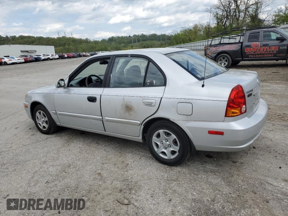 2004 Hyundai Accent GL with VIN KMHCG45C94U515186, listed as a Copart auction lot 52697284 with 49,236 mi miles and Salvage Title. Bid and sale history available at carsss.com. Image 2.