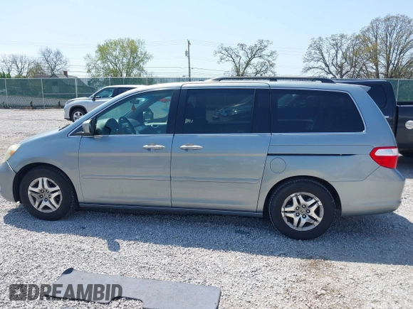 2007 Honda Odyssey EX with VIN 5FNRL38457B042912, listed as a IAAI auction lot 41992847 with 194,822 mi miles and . Bid and sale history available at DreamBid. Image 14.