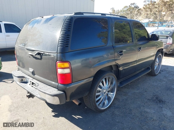 2003 Chevrolet Tahoe LT with VIN 1GNEC13T23R289916, listed as a IAAI auction lot 41408918 with 95,711 mi miles. Bid and sale history available at carsss.com. Image 4.