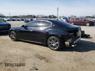 2018 Maserati Ghibli with VIN ZAM57XSA5J1286080, listed as a Copart auction lot 44283304 with 57,328 mi miles. Bid and sale history available at carsss.com. Image 2.