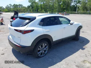 2024 Mazda CX-30 S Carbon Edition with VIN 3MVDMBCM2RM719131, listed as a IAAI auction lot 42265739 with 8,470 mi miles and . Bid and sale history available at DreamBid. Image 4.