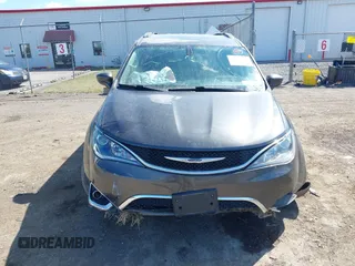 2018 Chrysler Pacifica Touring L with VIN 2C4RC1BGXJR356199, listed as a IAAI auction lot 41886721 with 111,514 mi miles and . Bid and sale history available at DreamBid. Image 12.