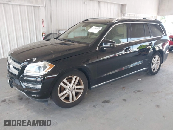 2014 Mercedes-Benz GL 450 z VIN 4JGDF7CE7EA435479, wystawiony jako IAAI lot #42280243 z przebiegiem 138 930 mil mil oraz . Historia ofert i sprzedaży dostępna na DreamBid. Obrazek 2.