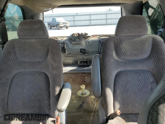 2000 Dodge Caravan SE with VIN 2B4GP45G0YR525310, listed as a Copart auction lot 69596394 with 299,957 mi miles and Salvage Title. Bid and sale history available at carsss.com. Image 10.