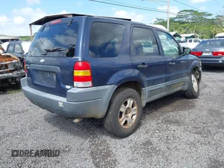 2003 Ford Escape XLT Popular 2 with VIN 1FMYU93193KB76369, listed as a IAAI auction lot 41895790 with 245,320 mi miles and . Bid and sale history available at DreamBid. Image 4.