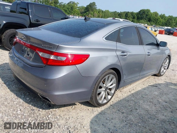 2015 Hyundai Azera Limited z VIN KMHFH4JG2FA483575, wystawiony jako IAAI lot #42422877 z przebiegiem 111 147 mil mil oraz . Historia ofert i sprzedaży dostępna na DreamBid. Obrazek 4.
