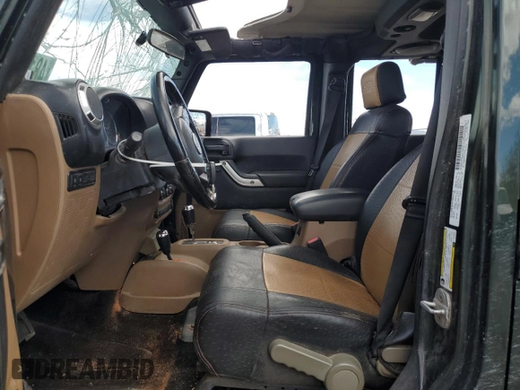 2012 Jeep Wrangler Unlimited Rubicon с VIN 1C4HJWFG4CL103531, выставлен на аукционе Copart как лот 48131665 с пробегом 183 234 миль миль и Списание • Salvage title. История ставок и продаж доступна на DreamBid. Изображение 7.