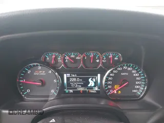 2018 Chevrolet Silverado 1500 LT with VIN 3GCUKREC5JG460979, listed as a IAAI auction lot 41741667 with 122,931 mi miles. Bid and sale history available at carsss.com. Image 7.