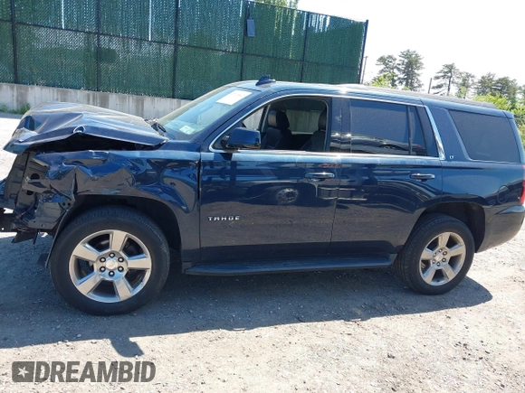 2020 Chevrolet Tahoe LT with VIN 1GNSKBKC6LR239081, listed as a IAAI auction lot 42298842 with 125,328 mi miles and . Bid and sale history available at DreamBid. Image 14.