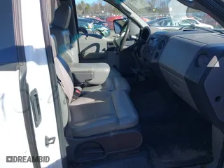 2005 Ford F-150 XL with VIN 1FTRF12285NB41452, listed as a IAAI auction lot 41903892 with 290,233 mi miles. Bid and sale history available at carsss.com. Image 5.