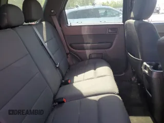 2012 Ford Escape XLT z VIN 1FMCU9DG1CKC54737, wystawiony jako Copart lot #59902055 z przebiegiem 206 067 mil mil oraz Szkoda całkowita • Salvage title. Historia ofert i sprzedaży dostępna na DreamBid. Obrazek 11.