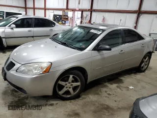2006 Pontiac G6 6-Cyl z VIN 1G2ZG558264248528, wystawiony jako Copart lot #57297965 z przebiegiem 192 193 mil mil oraz Szkoda całkowita • Salvage title. Historia ofert i sprzedaży dostępna na DreamBid. Obrazek 1.