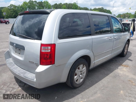 2009 Dodge Grand Caravan SE z VIN 1D8HN44E99B502171, wystawiony jako IAAI lot #42267604 z przebiegiem 166 131 mil mil oraz . Historia ofert i sprzedaży dostępna na DreamBid. Obrazek 4.