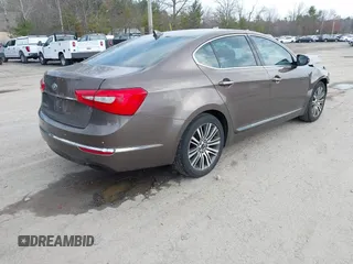 2014 Kia Cadenza Premium with VIN KNALN4D74E5164291, listed as a IAAI auction lot 42013820 with 140,765 mi miles and . Bid and sale history available at DreamBid. Image 4.