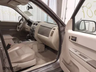2008 Ford Escape Hybrid with VIN 1FMCU59H18KC30939, listed as a IAAI auction lot 41575587 with 208,879 mi miles. Bid and sale history available at carsss.com. Image 5.