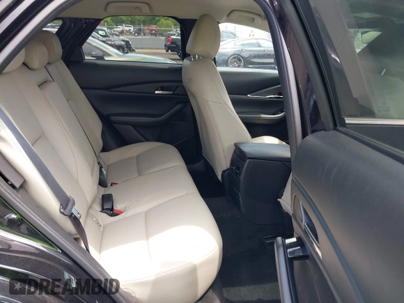 2023 Mazda CX-30 S Carbon Edition с VIN 3MVDMBCM7PM549197, выставлен на аукционе IAAI как лот 42224977 с пробегом 22 201 миль миль и . История ставок и продаж доступна на DreamBid. Изображение 8.