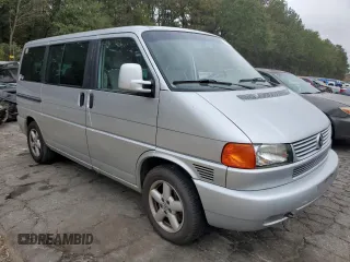 2002 Volkswagen EuroVan с VIN WV2KB47022H065941, выставлен на аукционе Copart как лот 79238234 с пробегом Не указан миль и Чистый • Clean title. История ставок и продаж доступна на DreamBid. Изображение 4.