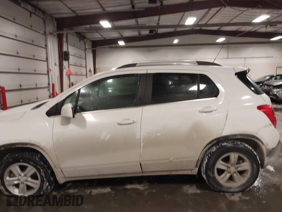 2015 Chevrolet Trax LT with VIN 3GNCJRSB7FL203418, listed as a IAAI auction lot 41572289 with 148,402 mi miles and . Bid and sale history available at DreamBid. Image 14.