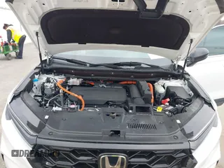 2025 Honda CR-V Sport Touring with VIN 7FARS6H9XSE043583, listed as a IAAI auction lot 41705098 with 6,020 mi miles and . Bid and sale history available at DreamBid. Image 10.