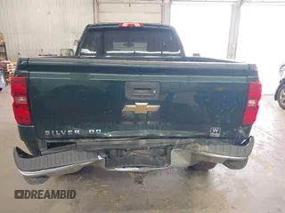 2015 Chevrolet Silverado 1500 LT with VIN 1GCVKREC2FZ147321, listed as a IAAI auction lot 41995003 with 148,053 mi miles and . Bid and sale history available at DreamBid. Image 6.
