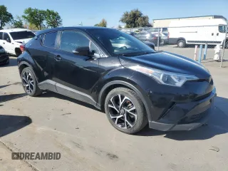 2018 Toyota C-HR XLE with VIN NMTKHMBX9JR022143, listed as a Copart auction lot 51127885 with 96,415 mi miles and Clean Title. Bid and sale history available at carsss.com. Image 4.