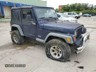2000 Jeep Wrangler Sport z VIN 1J4FA49S1YP713523, wystawiony jako Copart lot #58076745 z przebiegiem 117 112 mil mil oraz Czysty tytuł • Clean title. Historia ofert i sprzedaży dostępna na DreamBid. Obrazek 4.