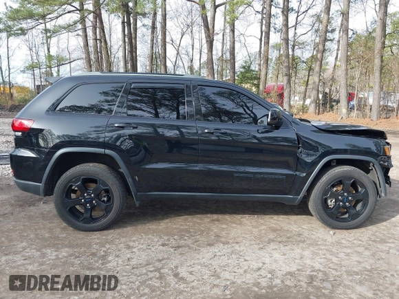 2018 Jeep Grand Cherokee Laredo E with VIN 1C4RJFAG1JC426542, listed as a IAAI auction lot 41729268 with 106,024 mi miles and . Bid and sale history available at DreamBid. Image 14.