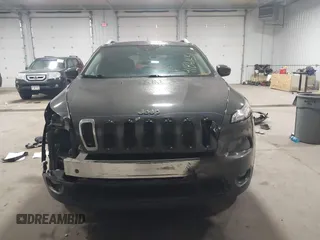 2014 Jeep Cherokee Altitude with VIN 1C4PJMCB2EW317346, listed as a IAAI auction lot 41861651 with 100,602 mi miles. Bid and sale history available at carsss.com. Image 12.