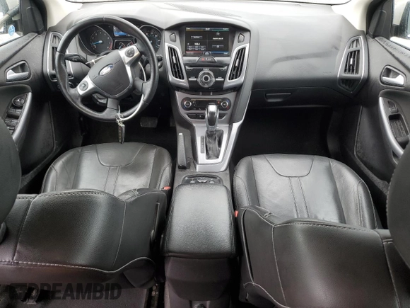 2014 Ford Focus Titanium with VIN 1FADP3N28EL418651, listed as a Copart auction lot 56723475 with 94,773 mi miles and Salvage title. Bid and sale history available at DreamBid. Image 8.