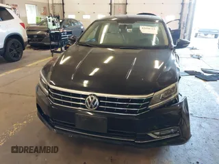 2017 Volkswagen Passat SE with VIN 1VWBT7A30HC019849, listed as a IAAI auction lot 42450723 with 73,236 mi miles and . Bid and sale history available at DreamBid. Image 12.