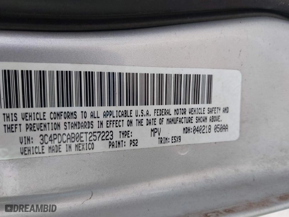 2014 Dodge Journey SE with VIN 3C4PDCAB0ET257223, listed as a IAAI auction lot 41766498 with 196,428 mi miles. Bid and sale history available at carsss.com. Image 9.