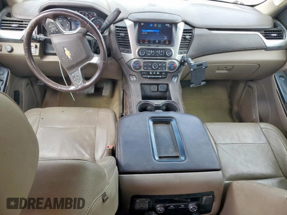 2015 Chevrolet Suburban LT with VIN 1GNSCJKC0FR153454, listed as a Copart auction lot 62672615 with 184,498 mi miles and Salvage title. Bid and sale history available at DreamBid. Image 8.