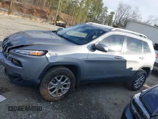 2015 Jeep Cherokee Latitude with VIN 1C4PJMCS8FW570785, listed as a IAAI auction lot 41398481 with 150,400 mi miles and . Bid and sale history available at DreamBid. Image 14.