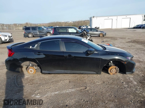 2020 Honda Civic Si z VIN 2HGFC1E57LH700157, wystawiony jako IAAI lot #41935665 z przebiegiem Nie podano mil oraz . Historia ofert i sprzedaży dostępna na DreamBid. Obrazek 12.