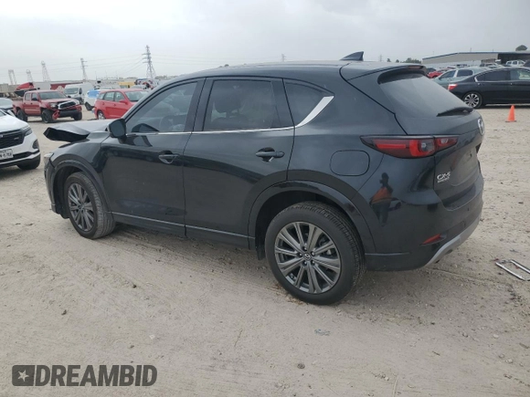 2024 Mazda CX-5 2.5 Turbo Signature with VIN JM3KFBXYXR0366308, listed as a Copart auction lot 83253424 with 8,741 mi miles and Salvage Title. Bid and sale history available at carsss.com. Image 2.